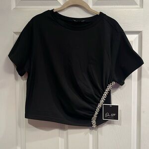 On 12th brand size L pullover short sleeve tee with embellishments. NWT.